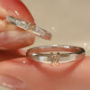 oly-d83f5d9be33cd3ff7677909344a05226 Wholesale Sterling Silver Eternal Heart Knot Couple Ring Valentine's Day Ring for Men and Women Simple Exquisite Unique Color-separation Adjustable