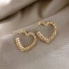Wholesale 925 Spring and Summer Design Sense Simple Fashion Texture Metal Peach Heart Love Pearl Earrings