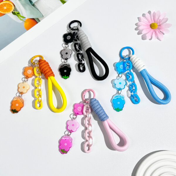 oly-d8c829c001b323239aa9ad3f96a958e1 Wholesale Ins style flower acrylic pendant student key bag hanging ornaments anti-lost key chain wholesale woven hand rope