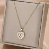 Wholesale Fashionable Heart Shaped Pendant Necklace With Synthetic Zircon And Simulated Diamond Surrounding Water Wave Chain Design Unisex