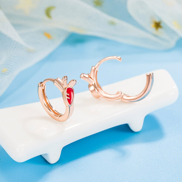 Wholesale Rabbit radish ear buckle women's elegant small simple cute asymmetric earrings niche exquisite earrings