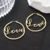 Wholesale Three-dimensional Love Earrings For Women In Copper With KC Golden Water Plating And 0.03µm Thickness