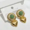 Wholesale Earrings Studs Cat's Eye Stone Heart Cast Earrings Titanium Steel Earrings For Banquet Fashion Show