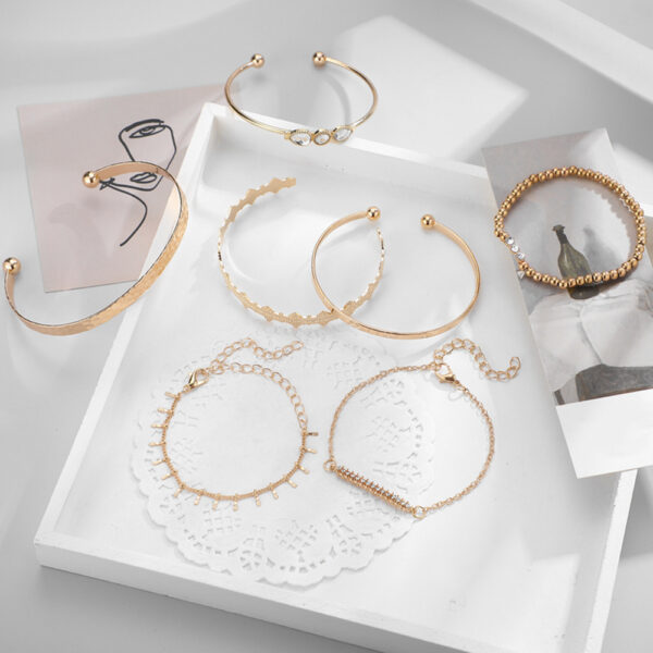 oly-dbaf059a9cd1bec8c0266d939e1a47fe Wholesale Alloy Bracelet Set, 7-Piece Set, Simple Retro Punk Style with Seven Letter Elements