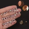 oly-dd1c3d86e8d034362ea2988008d4b4d9 Wholesale 316L Stainless Steel Copper Ear Cartilage Rings & Studs Flower Waterproof Non Tarnish Surgical Steel