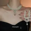 Wholesale Flowers Pendant Necklace For Women With Alloy Pendant Material Featuring Imitation Pearl And Rhinestones In White