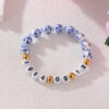 Wholesale  Gold Stainless Steel Love Acrylic Alphanumeric Small Gold Beads Blue and White Porcelain Beaded Valentine's Day Bracelet