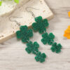oly-e01b2671ee23578b0e252b4421b898d2 Wholesale Patrick's Day clover love flow sequins horseshoe hollow earrings earrings High sense Carnival