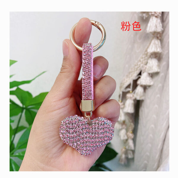 oly-e03d297c16f955c1955f98cf50020e53 Wholesale creative high-grade rhinestone heart car keychain Japanese and Korean ladies accessories diamond rope bag pendant