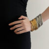 oly-e04c01eac7e4ab4156708a0ae7539d49 Wholesale Light Luxury Multi-layer Gold and Silver Stacked Stretch Bracelet Women's Niche High-end Retro Bracelet Autumn and Winter Hand