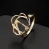 Wholesale Women’s Flowers Ring In Copper With Golden Electroplated Finish Featuring Gem Inlay