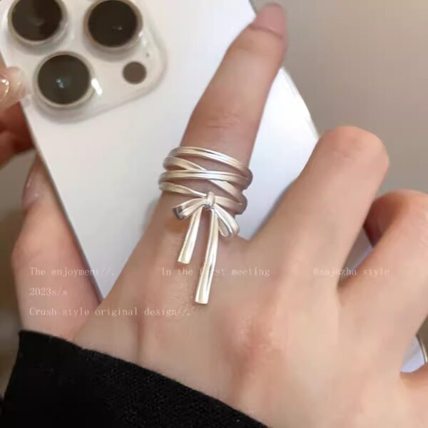 oly-e19cf24c878156bdaf13b4b09542bc22 Wholesale Ballet style bow ribbon open ring female niche design adjustable diet finger ring unique internet celebrity ring fashion