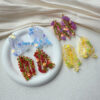Wholesale South Korea East Gate Laser Sequin Flower Tassel Earrings Vacation Style Eye-catching Bright Eye Strap Long Dress All-match Earrings