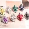 oly-e2b890ce1f148437234c7abcd33b6e5e Wholesale Asymmetrical Irregular Stud Earrings For Women With May Birthstone Emerald In Golden Plated Zinc Alloy And Acrylic Inlay