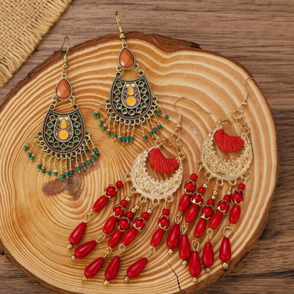 oly-e2d1ff0d1f9406ada32dc5f638088eb1 Wholesale Ethnic earrings exotic mood retro metal hollow flower earrings Bohemian carved court style earrings