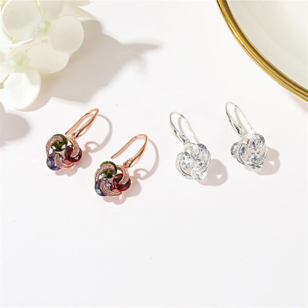 oly-e36939c6d853bc1857c28650ab7507d2 Wholesale selling earrings temperament micro-inlaid zircon earrings female simple color diamond windmill earrings