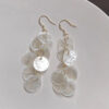 oly-e46c5421d8bfe953bca1dd026316ce6f Wholesale Holiday Style Long Tassel Shell Earrings Summer Seaside Elegant Niche All-match Earrings High-end Exaggerated Earrings