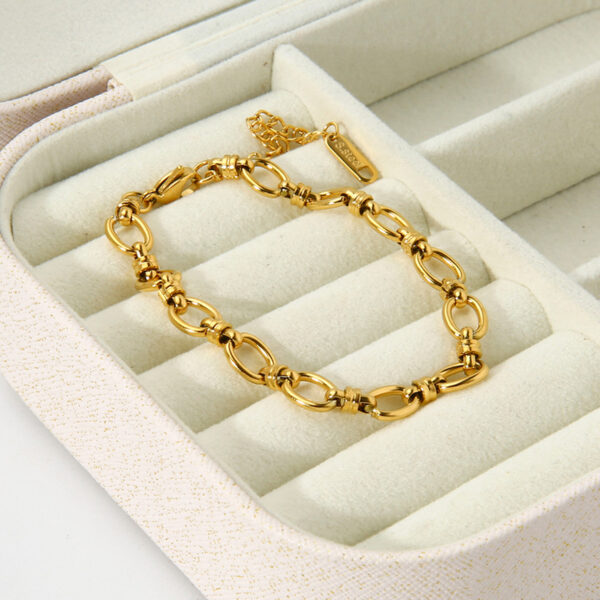 oly-e4b3d37e9f6c110d769795fe6e7d43bf Wholesale Oval Chain Cross Buckle Bracelet 18K Gold-plated Stainless Steel Fashion Women's Fashion Bracelet Hand