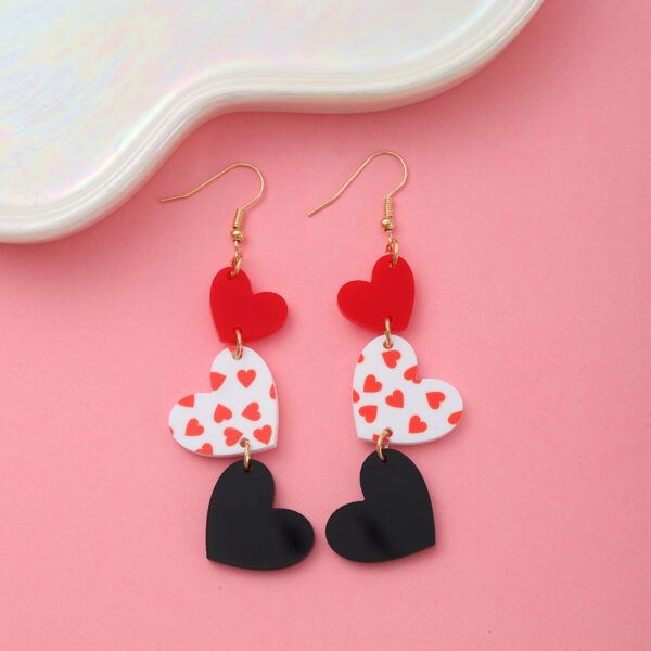Wholesale Valentine's Day love acrylic sequin earrings peach heart sweet personality high sense earrings women