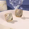 Wholesale Hypoallergenic Flowers Stud Earrings For Women With Freshwater Pearl Inlay, Copper Base, And KC Golden UV Plating