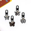 oly-e5c1b63abba87aee0629b70fb762b49d Wholesale game series trendy skull butterfly keychain Halloween vintage pendant cold style all-match OLY Exclusive