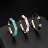 Wholesale Round Enamel Rings For Women In Copper With 14K Real Gold Electroplated Finish Featuring Zircon Inlay
