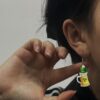 oly-e7a5dea508d1f62686f8a492a45cd326 Wholesale San Pachrette Holiday Earrings Green Cute Animal Bow Acrylic Frog Parade Earrings
