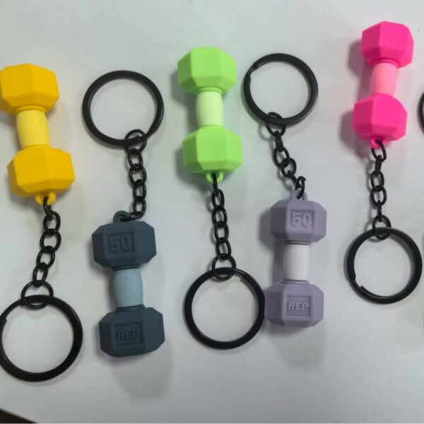 oly-e7a7ef917e89a1bfb5342d079d38bdca Wholesale Dumbbell barbell key chain PVC soft rubber fitness equipment pendant sports pendant factory direct sales
