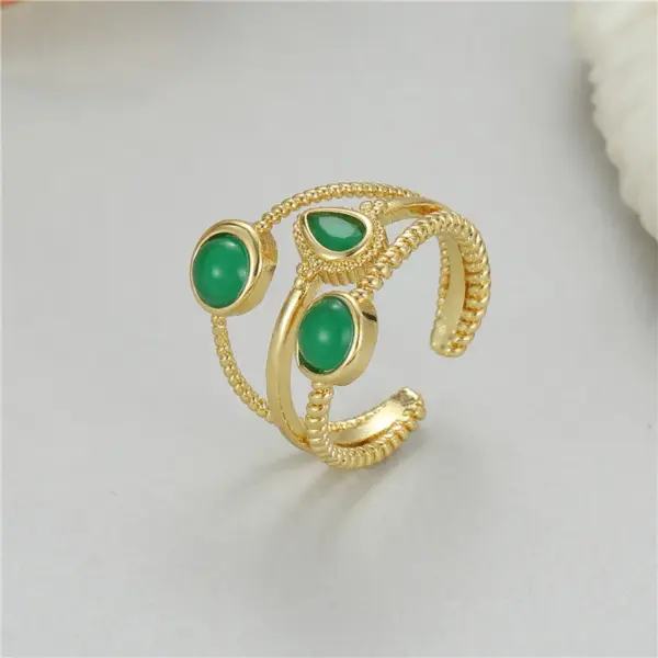 Wholesale Unisex U Shape Open Ring In Copper With 14K Real Gold Electroplated Finish Featuring May Birthstone Emerald