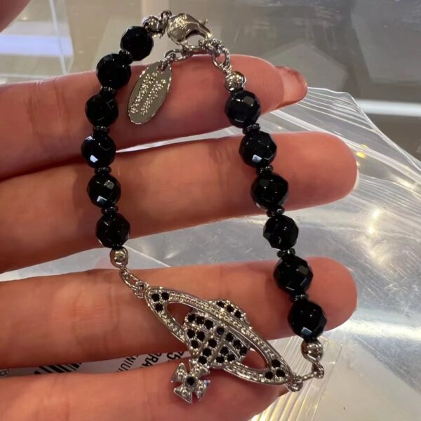 oly-e95ab9e900703c9f51e7c6e697c66e85 Wholesale Satin Pearl Black Agate Bracelet Fashionable Cool Style Elegant Easiest for Match and White Bracelet for Women