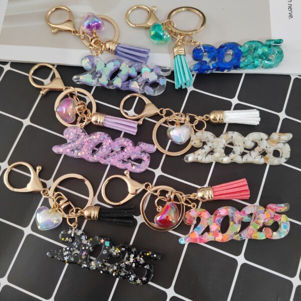Wholesale Resin flash years digital creative accessories popular love hanging sequins mixed color keychain