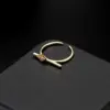 Wholesale Geometric Open Rings For Women In Copper With 14K Real Gold Electroplated Finish Featuring Artificial Gemstones