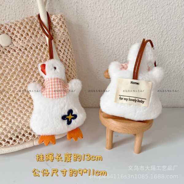oly-ea4b845fcda8f0b78b8cfa5b5e8e0613 Wholesale Creative Cartoon Big White Goose Plush Pendant Cute Bib Duck Doll Hanging Ornaments Grasping Machine Doll Bag Accessories Gift
