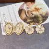 Wholesale French Style Oil Painting Drip Earrings Beige Sweet Niche Design Versatile Elegant Shell Embedded Copper Earrings For Women