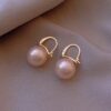 Wholesale Simple Style Round Alloy Inlay Pearl Women's Earrings