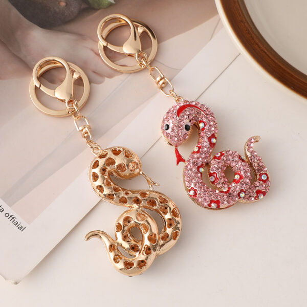 oly-eb5a17b40808152419331888da170351 Wholesale Creative cartoon diamond twelve zodiac snake metal car keychain national tide this year pendant small gifts