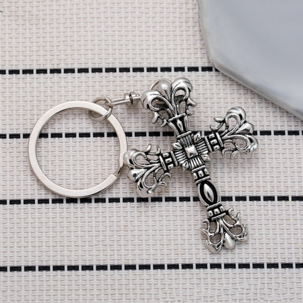 oly-eb891f67474a46e23e92a412bbf0ba2d Wholesale Crow flame cross keychain niche punk retro do pendant car pendant