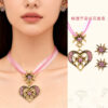 Wholesale Electroplated zinc alloy beer festival necklace with heart-shaped diamond-encrusted edelweiss set, Nordic style jewelry.