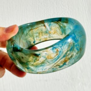 Blue and green ink smudged