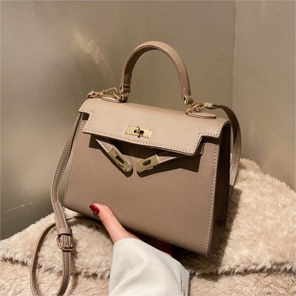 oly-ec6616eef7d286670a24b1ca136509ae Wholesale French Niche Texture Hand Bag Women's Bag Fashionable Simple Crossbody Bag Popular Kelly Bag