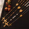 Wholesale British Style Niche Retro Rosary Cross Design Sense Figure Round Brand Pendant Design Sense Light Luxury Titanium Steel Necklace