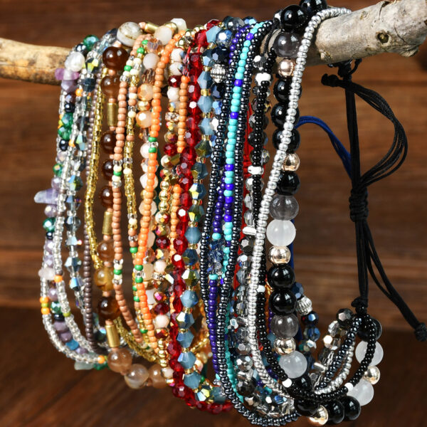 oly-ed4b6da1b37a8f82f6c8a6fa1c3a995b Wholesale Bohemian multi-layer natural gravel crystal beaded bracelet female minority high-end hand woven hand rope