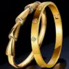 Wholesale Heart Shape Waterproof Non Tarnish Gold Bangle For Women In Simple Style With Rhinestones Inlay And 304 Stainless Steel
