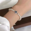 oly-edd01be998bcc78a0a67386f307e111e Wholesale Mermaid's tears navy blue sapphire artificial pearl beaded bracelet Year light luxury niche design bracelet