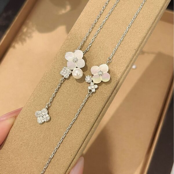 Wholesale Copper vintage four-leaf clover white shell tassel necklace, five-flower bracelet, earrings