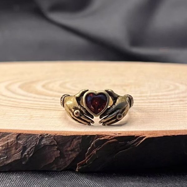 oly-ef1988fc5e4a62ac116b1380273b9a33 Wholesale Trendy Retro Carving Hands Embrace Red Zircon Couple's Ring Finger Ring Design All-match Valentine's Day for Women