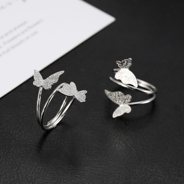 oly-ef3f6702b48582df0459a4526b7d6942 Wholesale Exaggerated Butterfly Open Ring Simple Alloy Index Finger Ring Irregular Hand Jewelry Accessories