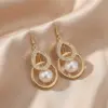 Wholesale Gold Water Droplets Ear Hook Earrings For Women In Zinc Alloy With Fish Hook Wires