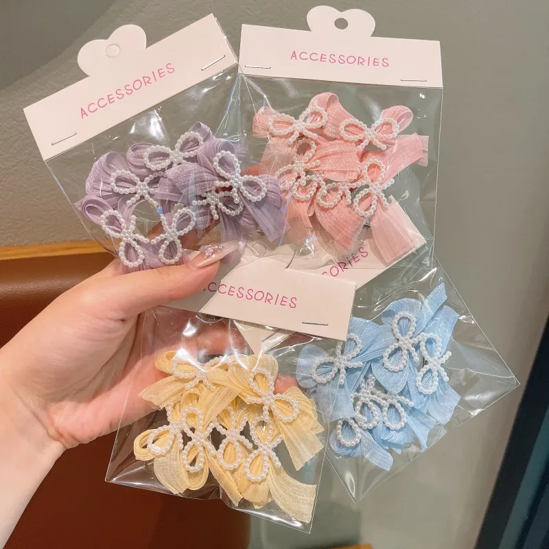 Wholesale Sweet Pearl Ribbon Butterfly Knot Hair Clip For Girls Children's Hair Accessories Festive Outdoor Daily Use Four Seasons