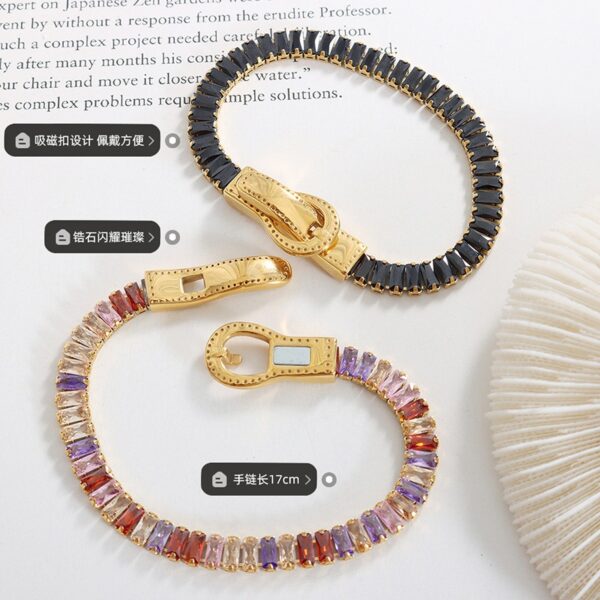 oly-f01974e5ddb6c8332b44f88953defb1d Wholesale light luxury seven kinds of color zircon double-sided iron buckle design suction bracelet titanium steel gold-plated four-corner buckle jewelry
